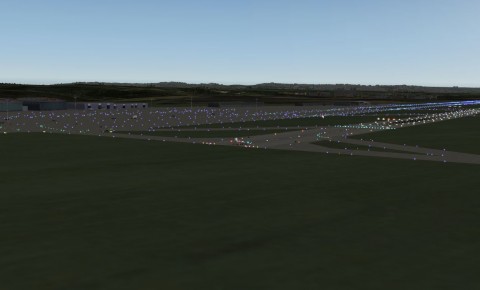 X-Plane 9: Im Flight Simulator sind hier zahlreiche Geb&auml;ude, Bodenverkehr und andere Details zu sehen