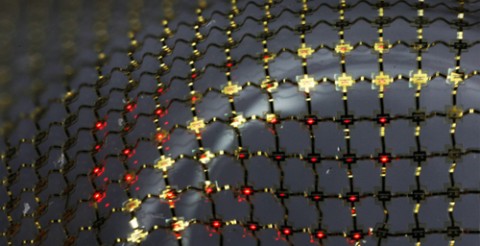 Dehnbares Display aus Micro-LEDs, bestehend aus einem gebundenen Netz gedruckter Micro-LEDs, gebunden auf einem Gummi-Substrat.