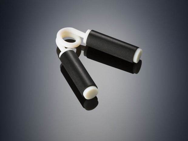Ein Trimmgerät aus einem harten Kunststoff mit weichen Griffen (Bild: Stratasys)