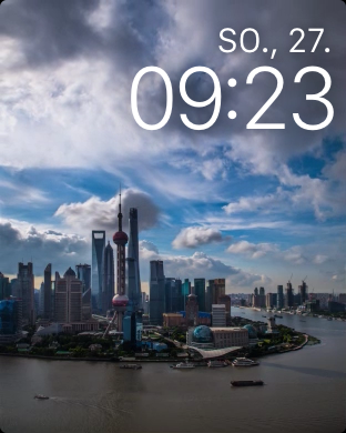 Nur eine Spielerei: Neue Uhrenansichten mit einem Video einer Stadt. (Screenshot: Golem.de)