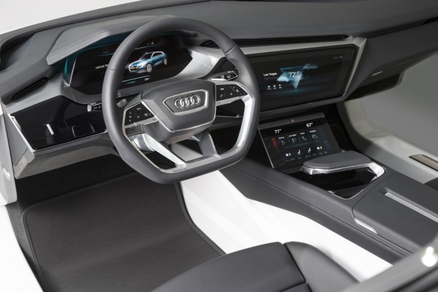 Auf dem Lenkrad gibt es kleine Touchpads mit Vibrations-Feedback. (Bild: Audi)