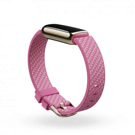 Das Luxe wird ausschließlich über den Bildschirm bedient. Optional ist der Tracker auch mit einem Gewebearmband verfügbar. (Bild: Fitbit)