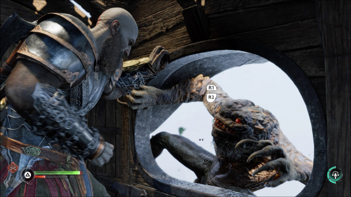 Kratos muss sich in einem Zug gegen übergriffige Monster wehren. (Bild: Sony / Screenshot: Golem.de)