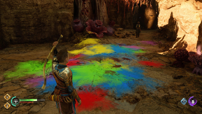 Nach einem Kampf befinden sich bunte Überreste am Boden. (Bild: Sony / Screenshot: Golem.de)