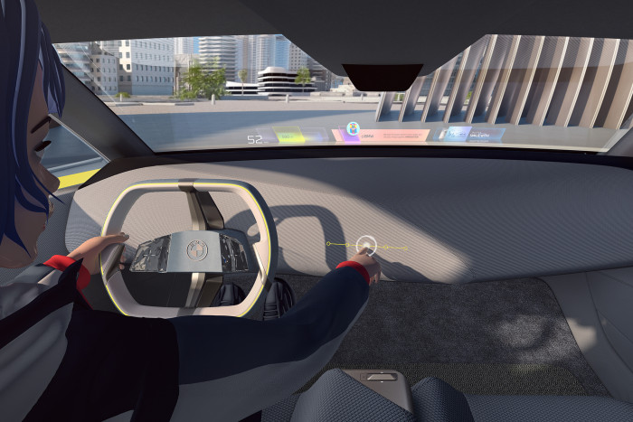 Mit dem sogenannten Mixed-Reality-Slider im Armaturenbrett l&auml;sst sich in f&uuml;nf Stufen das Ma&szlig; an digitalen Inhalten bestimmen. (Foto: BMW)