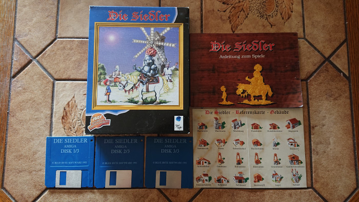 Die Siedler erschien urspr&uuml;nglich f&uuml;r den Commodore Amiga und wurde entsprechend auf einer Handvoll Disketten ausgeliefert. (Quelle: Medienagentur Plassma)