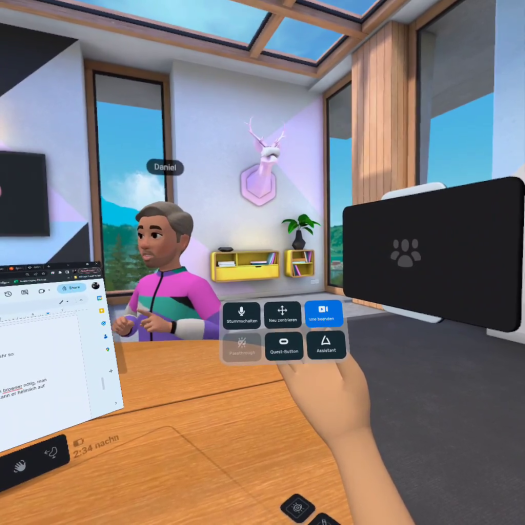 In den Workrooms sitzen wir am Schreibtisch. Mit Gesten lassen sich Schnellaktionen ausführen. (Bild: Martin Wolf/Golem.de)