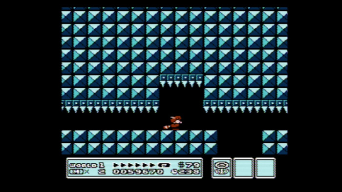 Achtung, Gefahr von oben! In diesem Levelabschnitt müssen wir die richtigen Lücken finden und uns rechtzeitig ducken, damit wir nicht von den Stacheln aufgespießt werden. (Bild: Nintendo/Screenshot: Medienagentur Plassma)