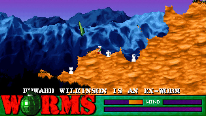 Geht ein Wurm drauf, verabschiedet er sich dramatisch: Er packt eine Sprengladung aus, blickt in die Kamera und jagt sich selbst in die Luft. Es bleibt ein Pixel-Grabmal. (Bild: Team 17 / Screenshot: Medienagentur Plassma / Olaf Bleich)